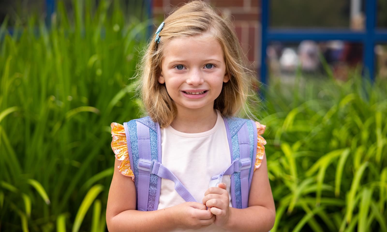 A girl smiles